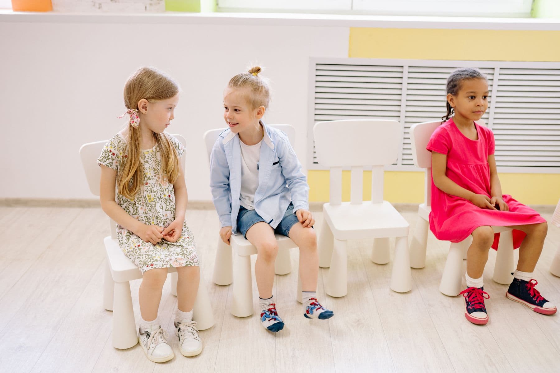Placeholder photo of children in a warm childcare setting